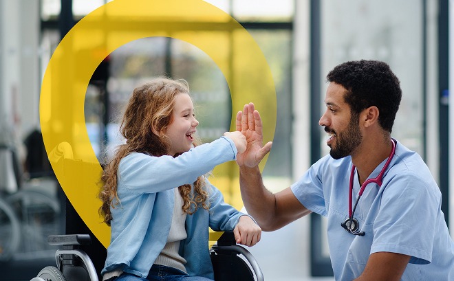 girl high-fiving a nurse